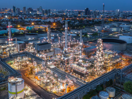 Aerial view of an oil refinery at night