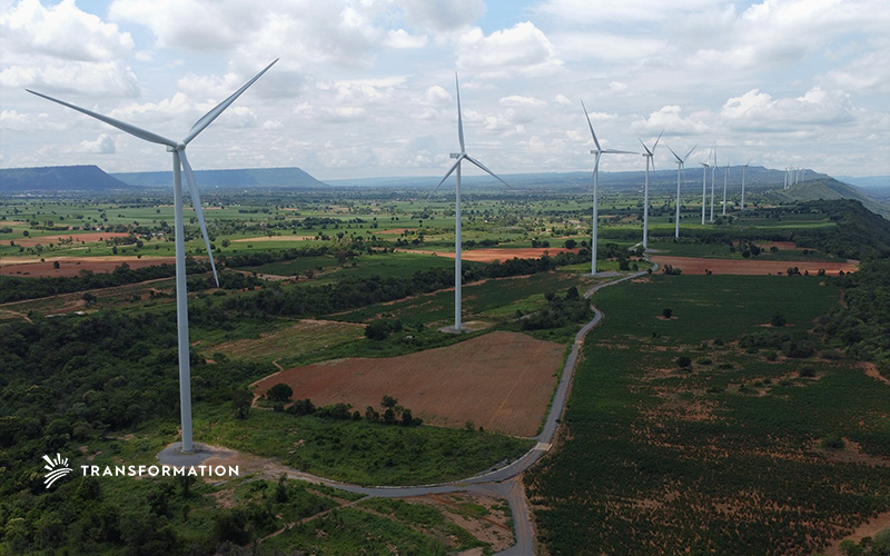 Wind turbines over farm fields
