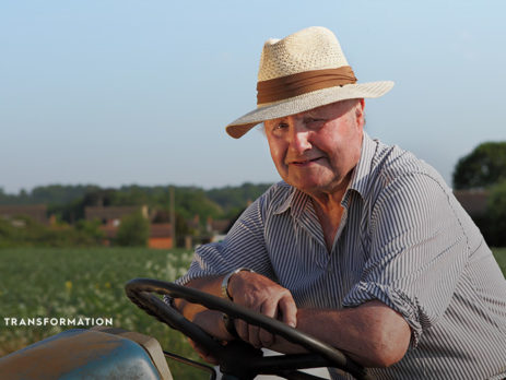 man on tractor at smallholder farm